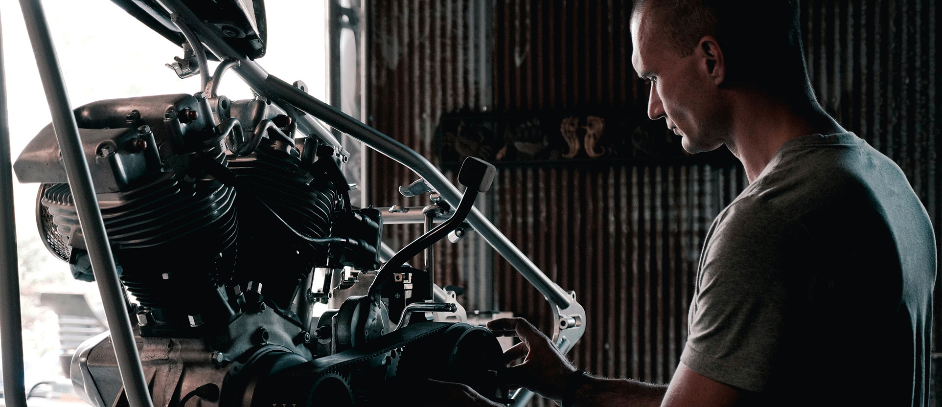 Man fixing engine Man fixing engine